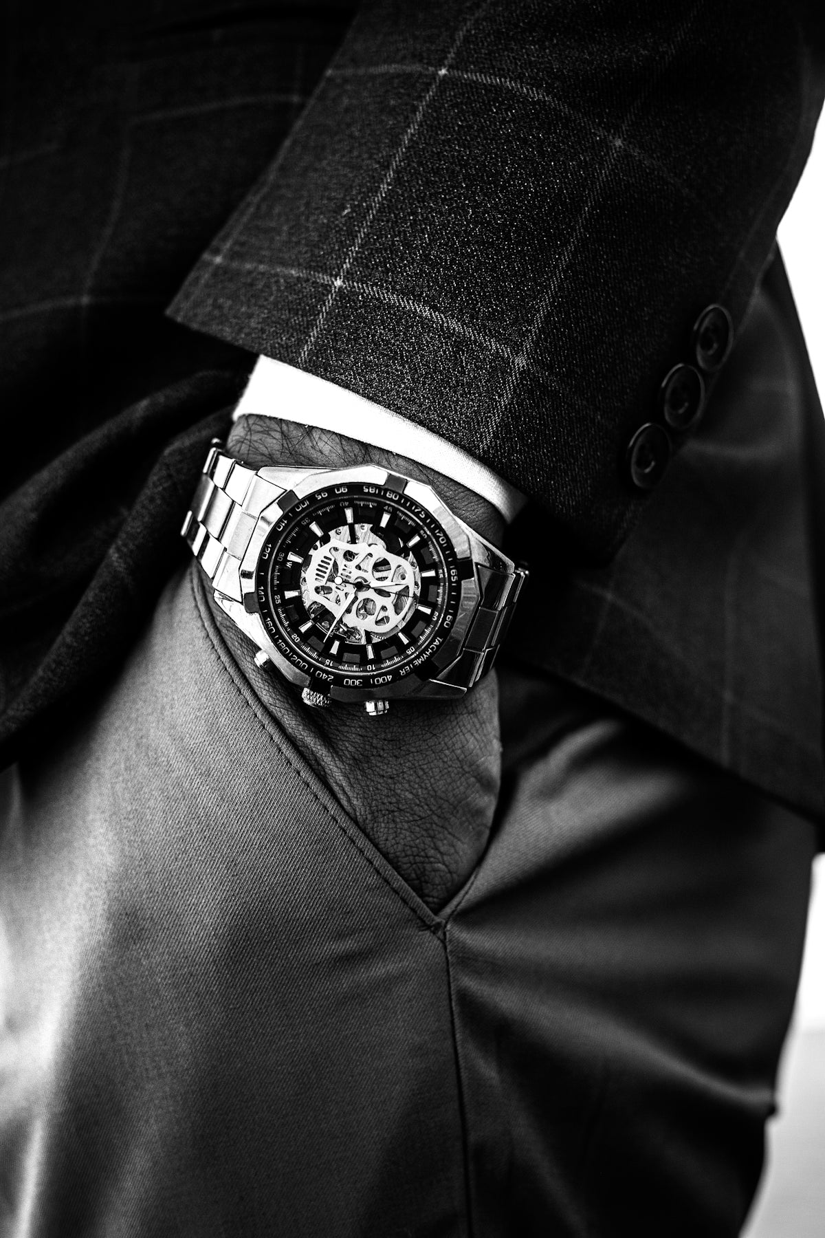 black and silver round chronograph watch