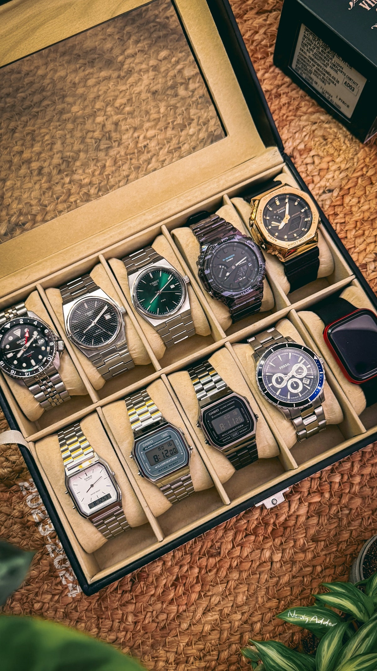 A box of watches sitting on top of a table