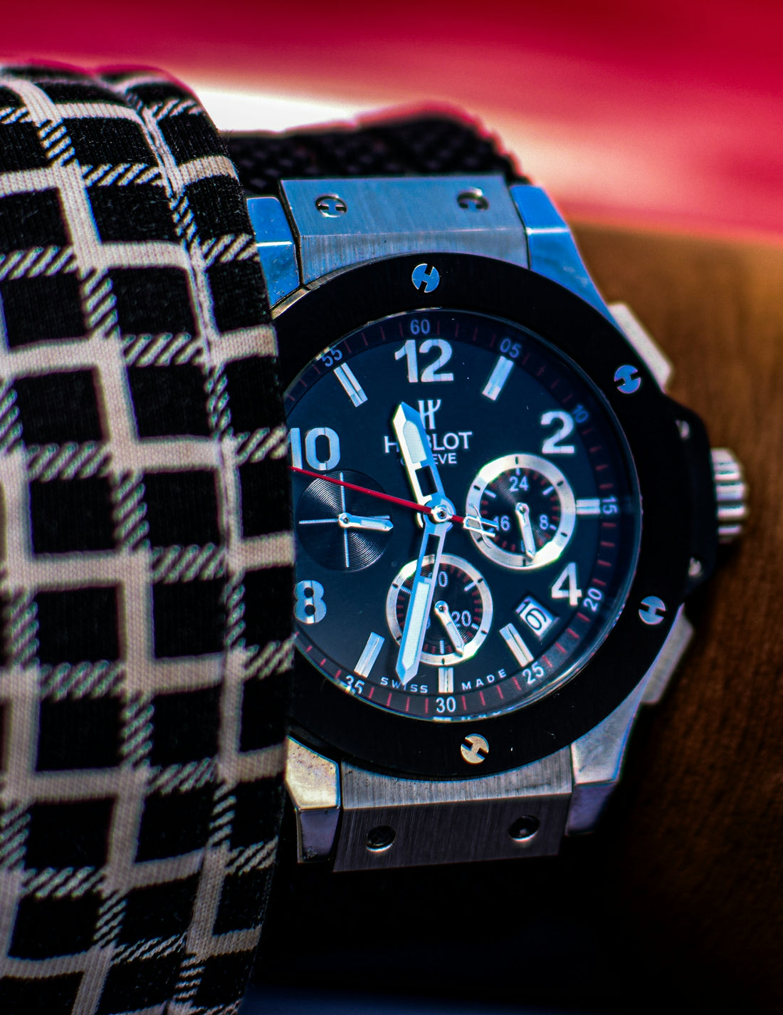 Close up of a man's luxury wristwatch on his arm.