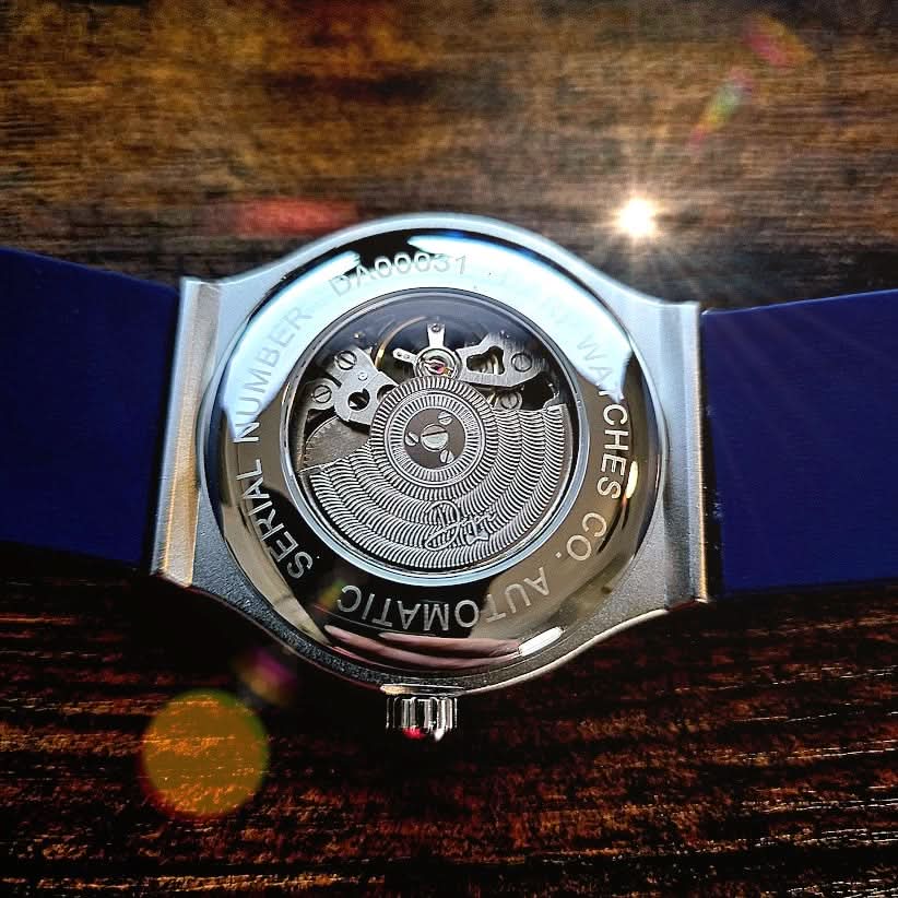 The back view of The 199 Blue - Skeleton Automatic Luxury Watch showcasing its intricate mechanics.