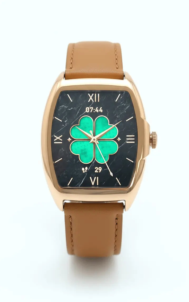 Rose gold smartwatch with a tan leather strap and a black marble-patterned face featuring a prominent green four-leaf clover design.