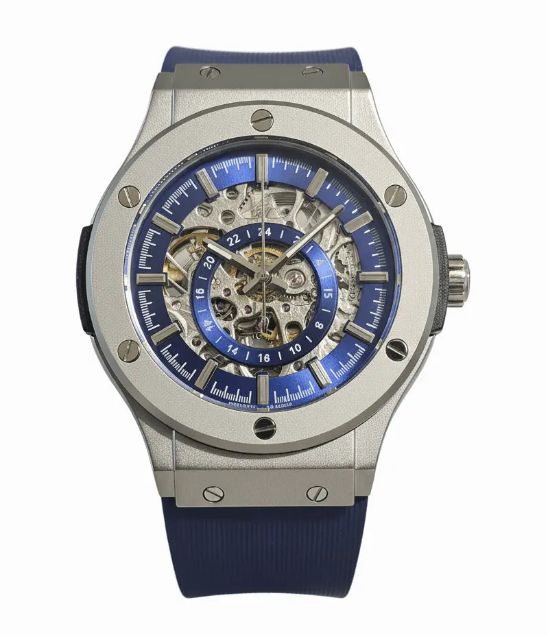 A sleek silver-toned skeleton watch with a vibrant blue dial and matching rubber strap, showcasing its intricate mechanical movement.